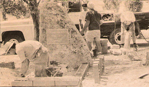 In respect for the memory of a former search and rescue team member who died on a search mission, members of the current team made improvements on Rick Lawrence Mosher's grave site last Monday. Pictured above are from left to right, Pete Schoerner, Cole Hampton, Jim Collins and John Ellsworth.