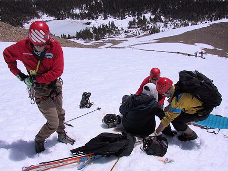 While victim's medical needs are attended to, anchors for the first belay step here and the second belay step below are set up - JW Photo