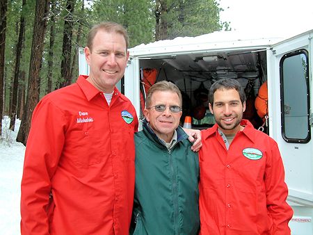 Mike Burdett (center) and team members