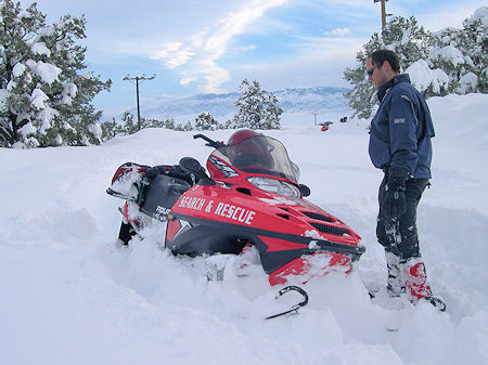 Snowmobiles used in deep snow in search for missing motorist