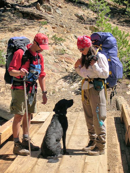 Rescue team members and dog taking a break