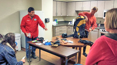 Rick Dodson and Jeff Holmquist reviewing ready pack contents