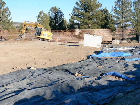 Drainage ditch in foreground awaiting finishing of fill - December 21, 2011