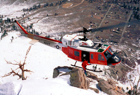 Entering hovering helicopter via skid - 3/31/1995